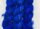 Recycled Sari Silk Yarn Prime - Indigo is available in multitude of colors, and being premium, you get extra length of yarn in the same weight. We fabricate Himalaya Silk Yarn from the bi-product of sari and silk production units. 