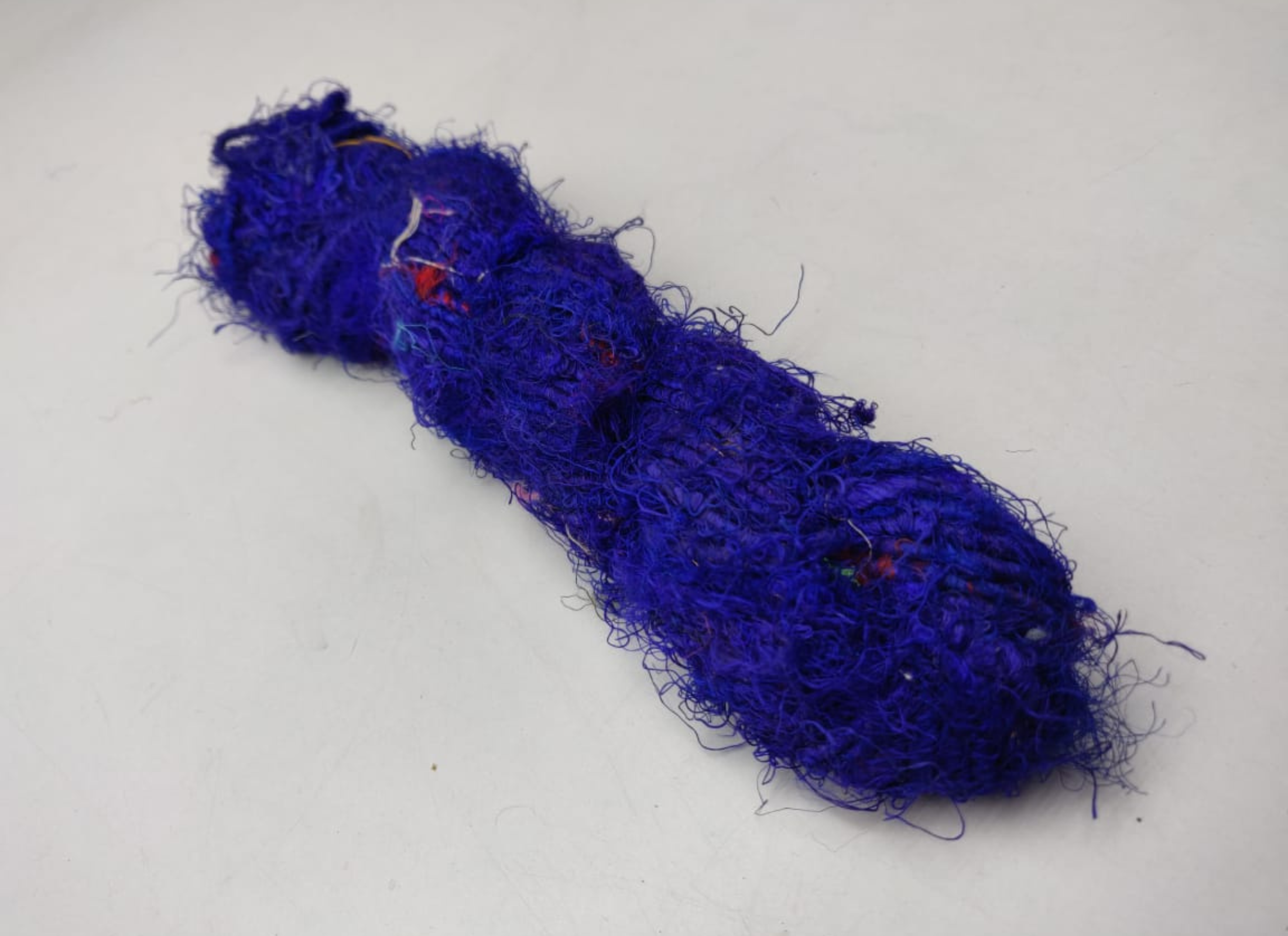 Recycled Sari Silk Yarn are the remnants of traditionally crafted Indian Saris and are extensively used in making hats, mittens, hued scarves, etc. We offer Recycled Sari Silk Yarn comprising of 100% and they are not over spun unlike some natural yarn. Each skein has distinct color, gauge, twist and texture. Varying in weight, our Recycled Sari Yarn are hailed for their quality and strength.