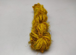 Recycled Sari Silk Yarn - Turmeric is available in multitude of colors, and being premium, you get extra length of yarn in the same weight. We fabricate Recycle Sari Silk Yarn from the bi-product of sari and silk production units.