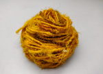 Recycled Sari Silk Yarn - Turmeric is available in multitude of colors, and being premium, you get extra length of yarn in the same weight. We fabricate Recycle Sari Silk Yarn from the bi-product of sari and silk production units.