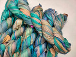 Recycled Sari silk Ribbon is the by-product of colorful saris that women wear in India. It is the loose ends of saris collected from industrial mills in India that is torn in stripes and sewn end to end to make beautiful and colorful ribbons. 