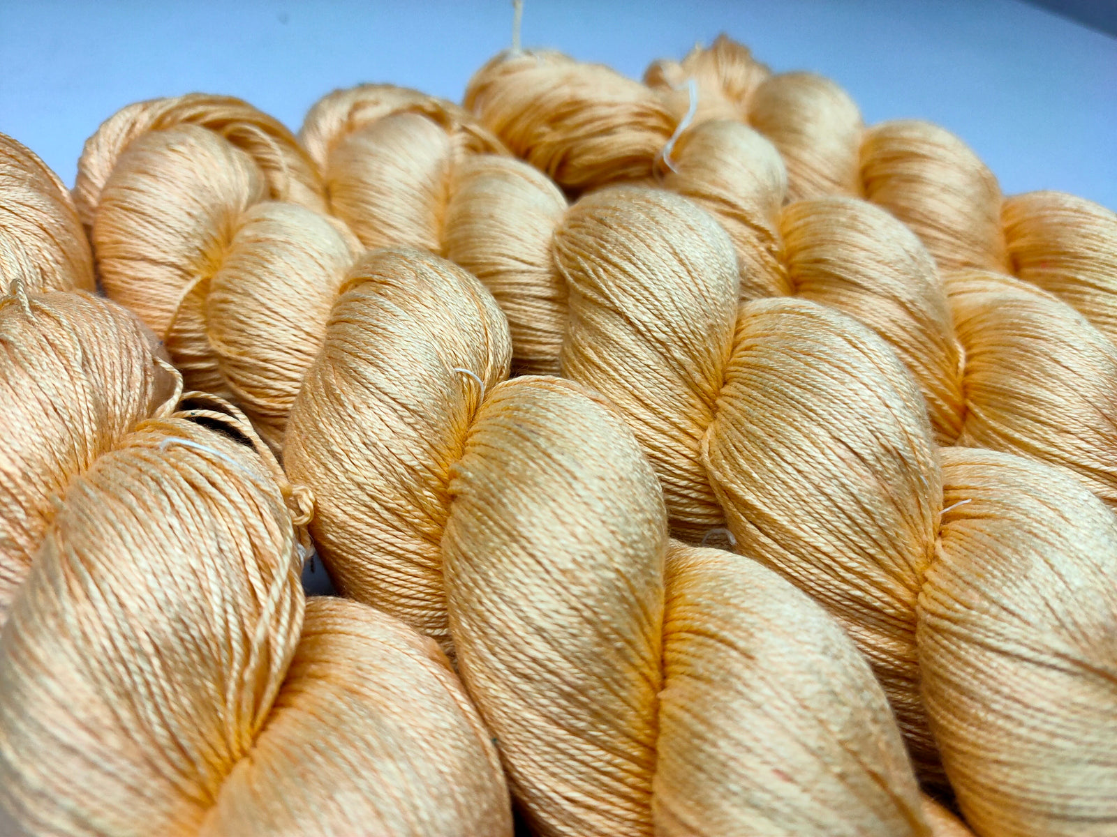 Mulberry Silk yarn (600 mts in 100gram) is a unique Silk Yarn ideal for Knitting. Mulberry Silk is very soft and shiny. It is Sock weight and is directly spun from the premium Mulberry Silk Tops. It is a yarn of Natural Protein Fiber. Mulberry Silk Yarn has compact structure, evenness, clean appearance, elegant luster, Good moisture-absorbing capability, good strength and elongation, with fine and soft fibers. It is useful for Weaving and Knitting.