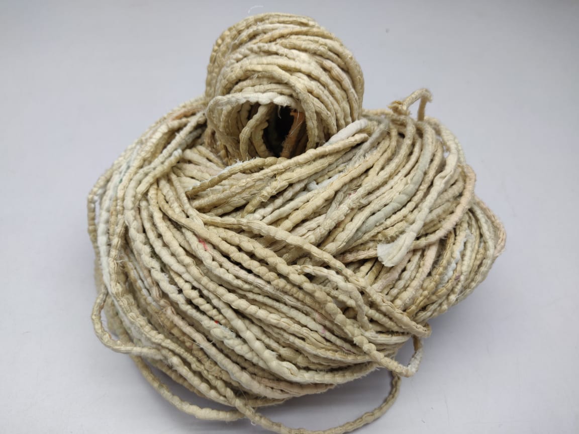 Cording Sari Silk Ribbon - Multicolor - SilkRouteIndiaFair Trade Recycled Lurex Hemmed Cording Sari Silk Ribbon yarn. Very sparkling! Made from Recycled Sari silk Ribbon which is the by-product of colorful saris that women wear in India. It is the loose ends of saris collected from industrial mills in India that is torn in stripes and sewn end to end to make beautiful and colorful ribbons. The vibrant colors and unique texture of these silk fabric, the s