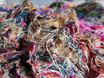 Sari Silk Waste Batts - Recycled Sari Silk waste Batts are the strongest natural fibers and is spun into a wonderful yarn used for knitting and weaving! The Silk Batts have a lovely draping quality. The batts is a smooth filament and the fabric out of it is comfortable against the skin. Silk is a natural protein fiber. Silk Batts are well known for its shine, lustre and tensile strength. This fiber is recycled and carded or processed into roving or batts form.