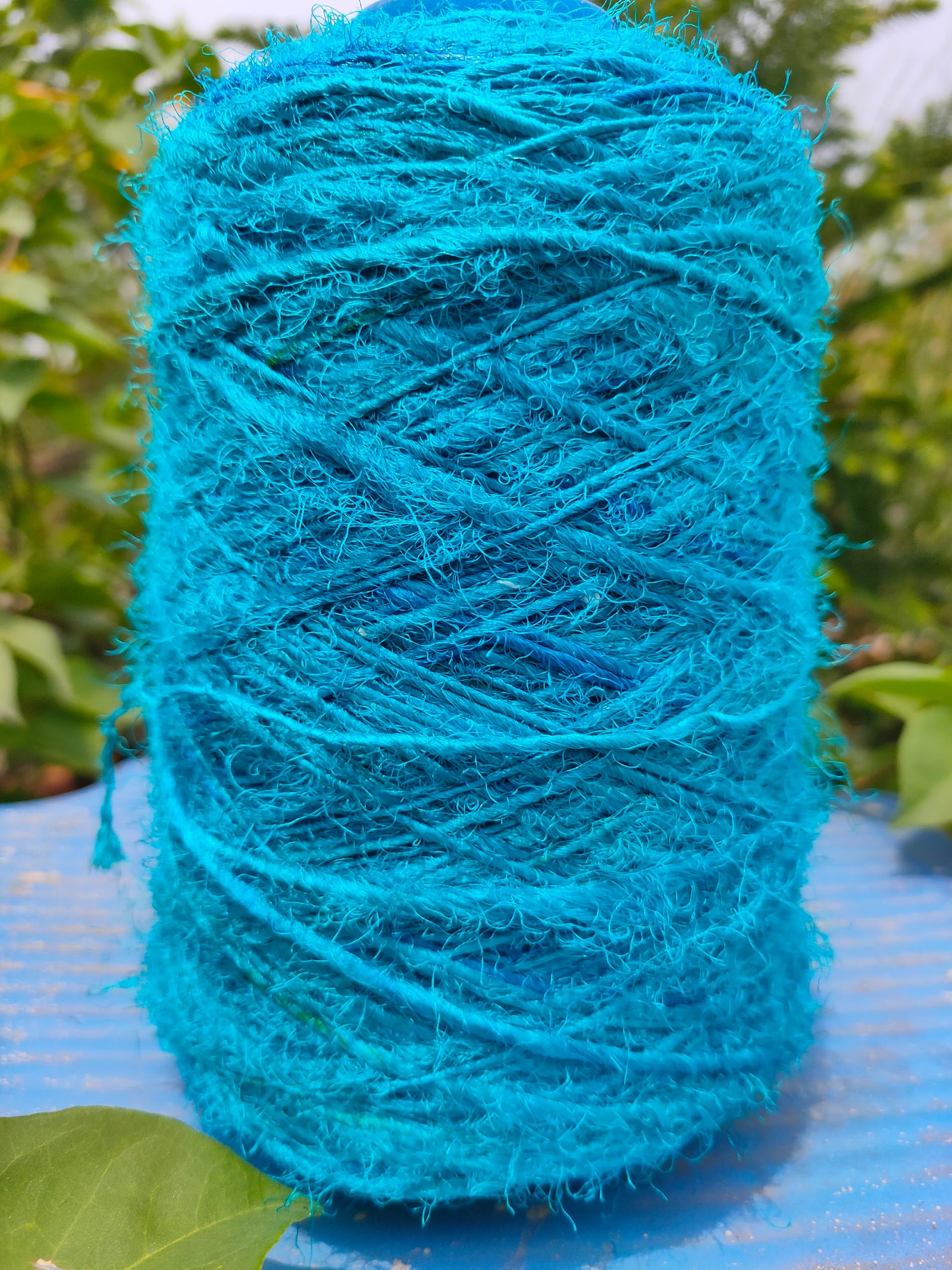 Recycle Sari Silk Yarn Prime - Sea Blue - SilkRouteIndia - Recycled Sari Silk Yarn Prime that is available in multitude of colors, and being premium, you get extra length of yarn in the same weight. We fabricate Recycled Sari Yarn from the bi-product of sari and silk production units.