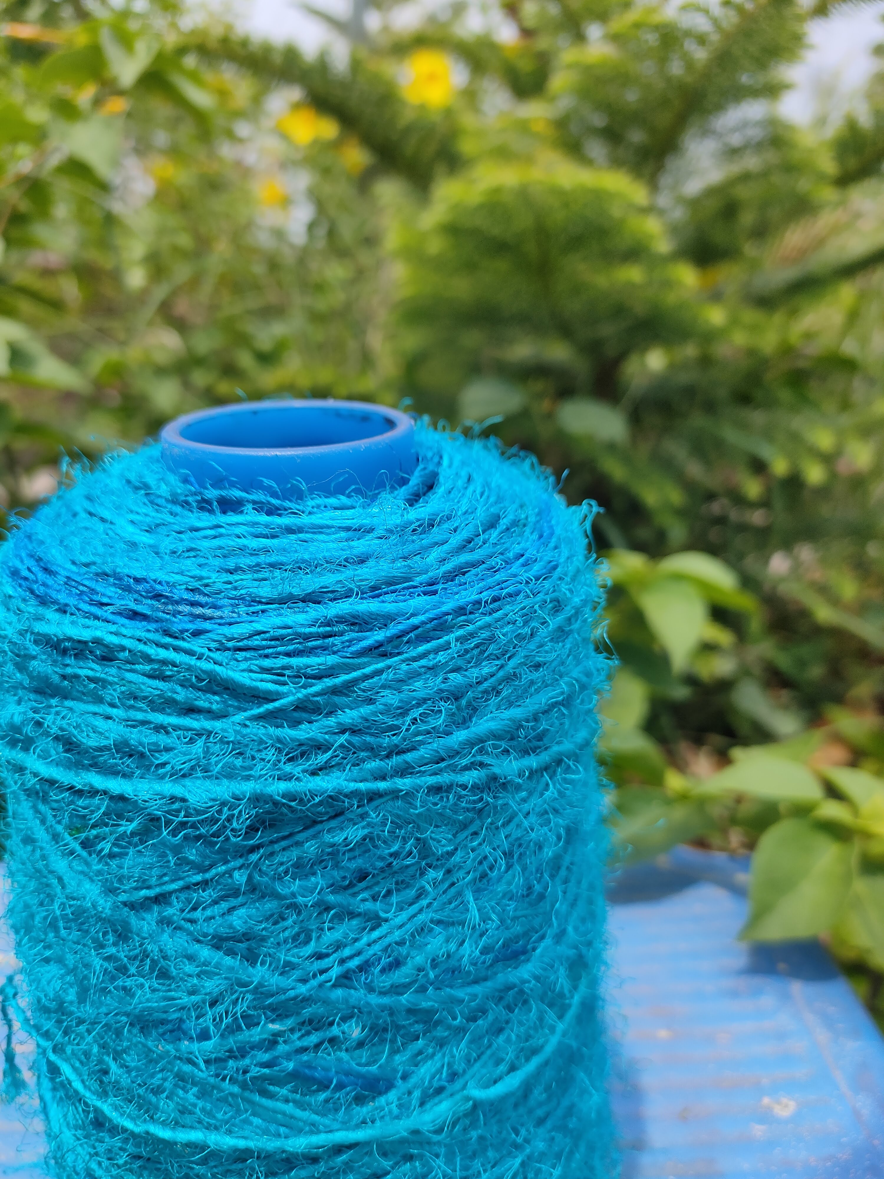 Recycle Sari Silk Yarn Prime - Sea Blue - SilkRouteIndia - Recycled Sari Silk Yarn Prime that is available in multitude of colors, and being premium, you get extra length of yarn in the same weight. We fabricate Recycled Sari Yarn from the bi-product of sari and silk production units.