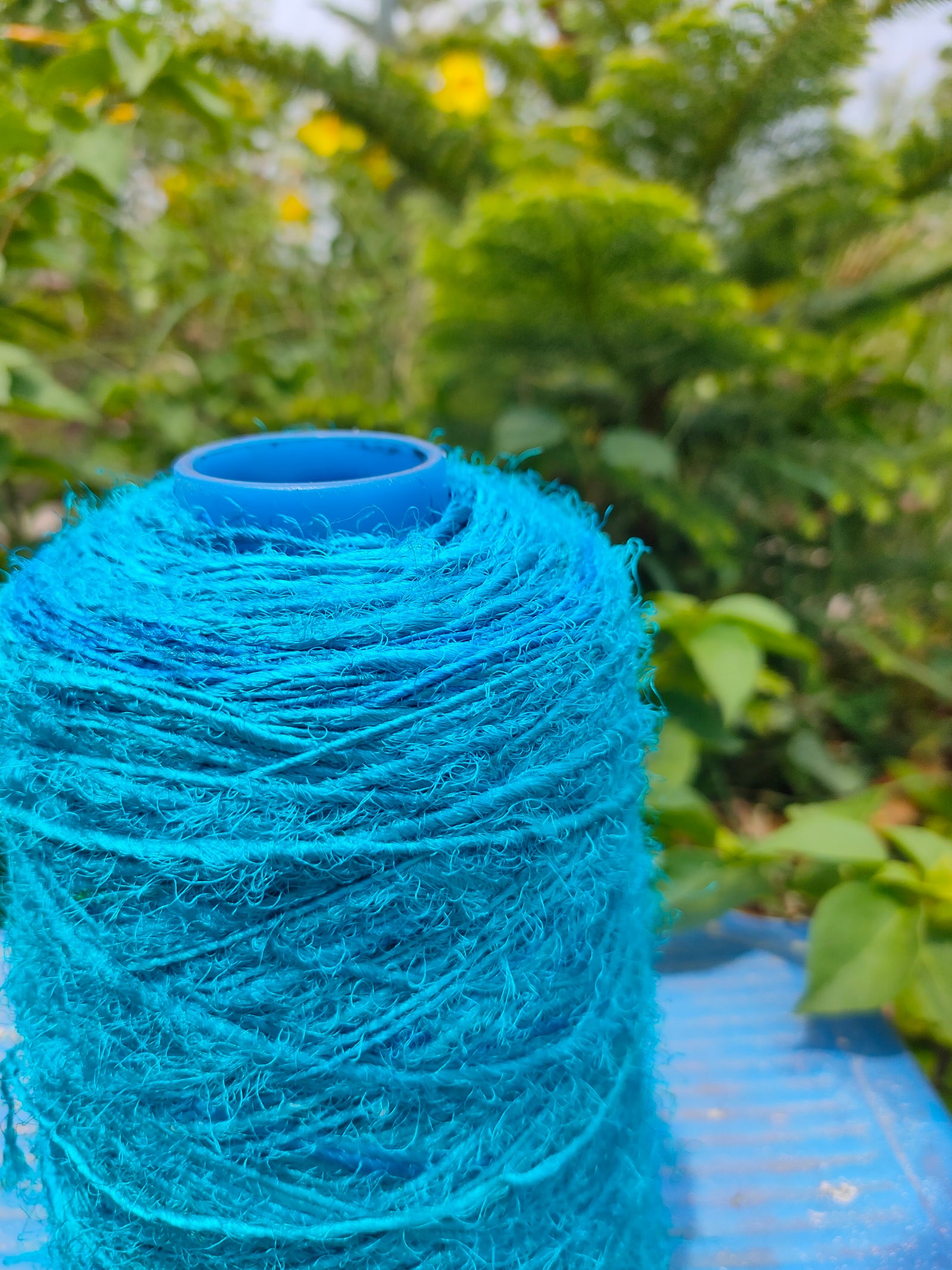 Recycle Sari Silk Yarn Prime - Sea Blue - SilkRouteIndia - Recycled Sari Silk Yarn Prime that is available in multitude of colors, and being premium, you get extra length of yarn in the same weight. We fabricate Recycled Sari Yarn from the bi-product of sari and silk production units.