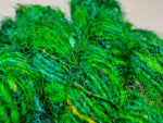 Recycled Sari Silk Yarn Green - SilkRouteIndia - Recycled Sari Silk Yarn is available in multitude of colors, and being premium, you get extra length of yarn in the same weight. We fabricate Recycle Sari Silk Yarn from the bi-product of sari and silk production units. The Yarn, available with us, is hand spun into bright hanks 