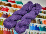 Noil Silk Yarn Purple - SilkRouteIndia Silk Noil Yarn is made from the short fibers of the cocoon from combing of silk and is very soft in nature. This has alook of wool, feel of soft cotton and a luxury of Silk. Ideally used for Weaving, Knitting and Crocheting proje