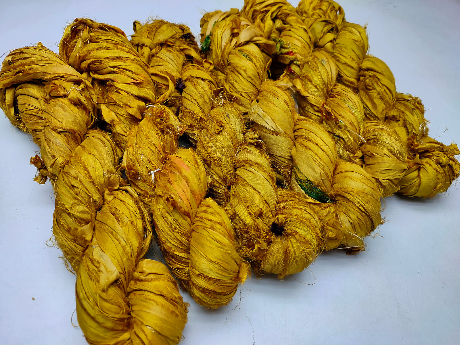 Recycled Sari Silk Ribbon - Canary - SilkRouteIndia Recycled Sari SilK yarn, Recycled Sari Silk Ribbon, Recycled Sari yarn, Recycled Silk Ribbon,upcycled ribbon, upcycled yarn, Himalaya Silk Yarn, Recycle Sari silk,	Recycle Silk,	Yarn for Knitting,	Knitting Yarn,	Crochet Yarn,	handcrafted yarn,	recycle sari yarn,	Sari Silk Yarn, reused ribbon, recycled ribbon