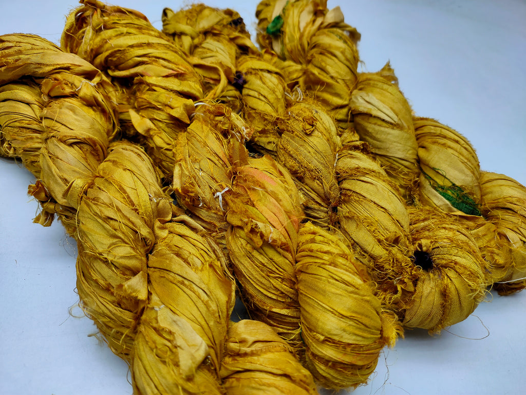 Recycled Sari Silk Ribbon - Canary - SilkRouteIndia Recycled Sari SilK yarn, Recycled Sari Silk Ribbon, Recycled Sari yarn, Recycled Silk Ribbon,upcycled ribbon, upcycled yarn, Himalaya Silk Yarn, Recycle Sari silk,	Recycle Silk,	Yarn for Knitting,	Knitting Yarn,	Crochet Yarn,	handcrafted yarn,	recycle sari yarn,	Sari Silk Yarn, reused ribbon, recycled ribbon