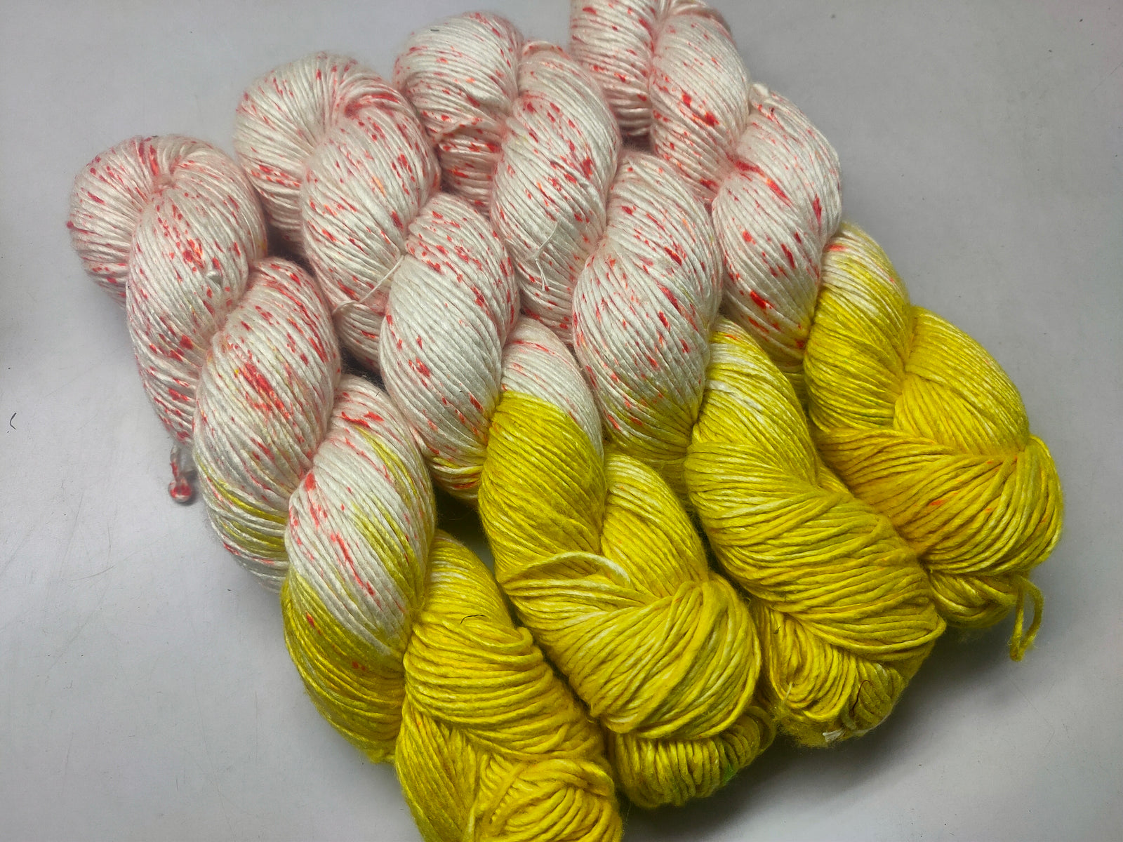 Mulberry Yarn Short Fiber - Sun Haze - SilkRouteIndia Mulberry Silk Yarn Short Fiber is a unique Silk Yarn ideal for Knitting. Mulberry Yarn is very soft and shiny. It is DK weight and is directly spun from the short fiber of Mulberry Silk Tops. It is a yarn of Natural Protein Fiber. Mulberry Yarn has compact structure, evenness, clean appearance, elegant luster, Good moisture-absorbing capability, good strength and elongation, with fine and soft fibers. It is Useful for Weaving and Knitting