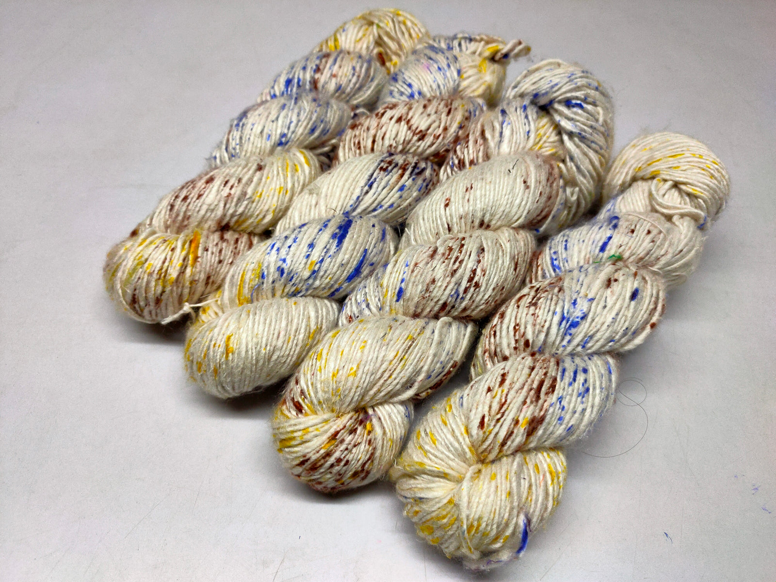 Mulberry Yarn Short Fiber - Choco Mango - SilkRouteIndia Mulberry Silk Yarn Short Fiber is a unique Silk Yarn ideal for Knitting. Mulberry Yarn is very soft and shiny. It is DK weight and is directly spun from the short fiber of Mulberry Silk Tops. It is a yarn of Natural Protein Fiber. Mulberry Yarn has compact structure, evenness, clean appearance, elegant luster, Good moisture-absorbing capability, good strength and elongation, with fine and soft fibers. It is Useful for Weaving and Knitting