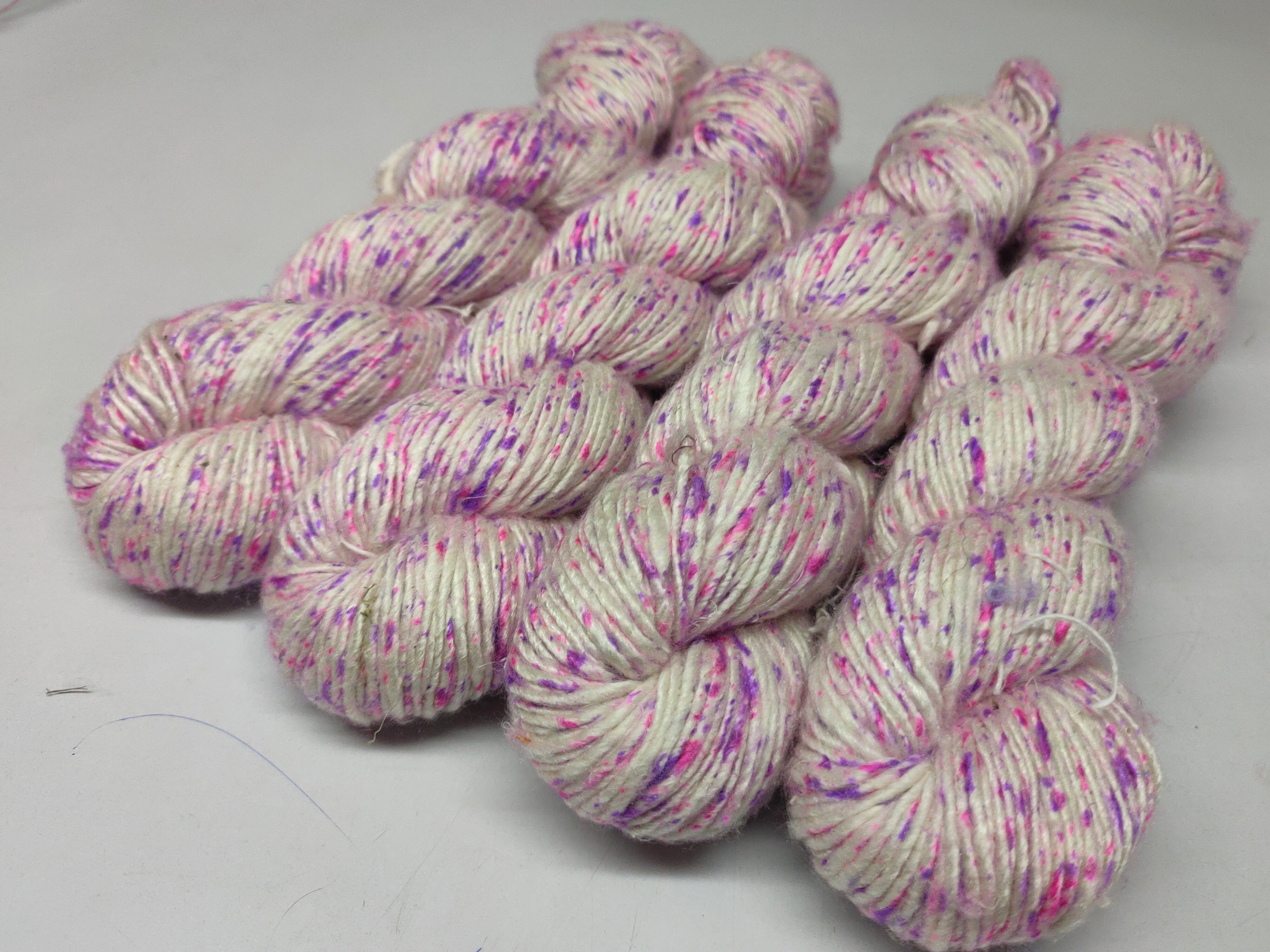 Mulberry Yarn Short Fiber - English Garden - SilkRouteIndia Mulberry Silk Yarn Short Fiber is a unique Silk Yarn ideal for Knitting. Mulberry Yarn is very soft and shiny. It is DK weight and is directly spun from the short fiber of Mulberry Silk Tops. It is a yarn of Natural Protein Fiber. Mulberry Yarn has compact structure, evenness, clean appearance, elegant luster, Good moisture-absorbing capability, good strength and elongation, with fine and soft fibers. It is Useful for Weaving and Knitting