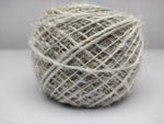 Recycled Sari Silk Yarn Prime Balls White - SilkRouteIndia Recycled Sari Silk Yarn(Prime*) that is available in multitude of colors, and being prime, you get extra length of yarn in the same weight. We fabricate Recycled Sari Silk Yarn(Prime*) from the bi-product of sari and silk production units. The Yarn, available with me, is hand spun into bright hanks initially and later is been converted to Balls which is suitable for number of Handicrafts applications.