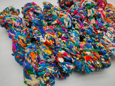 Recycled Yarn - Beng Tutti Frutti 3PLY is available in multitude of colors. We fabricate Recycled Sari Yarn from the bi-product of sari and silk production units. The Yarn, available with us, is hand spun into bright hanks which is suitable for number of Handicrafts applications.