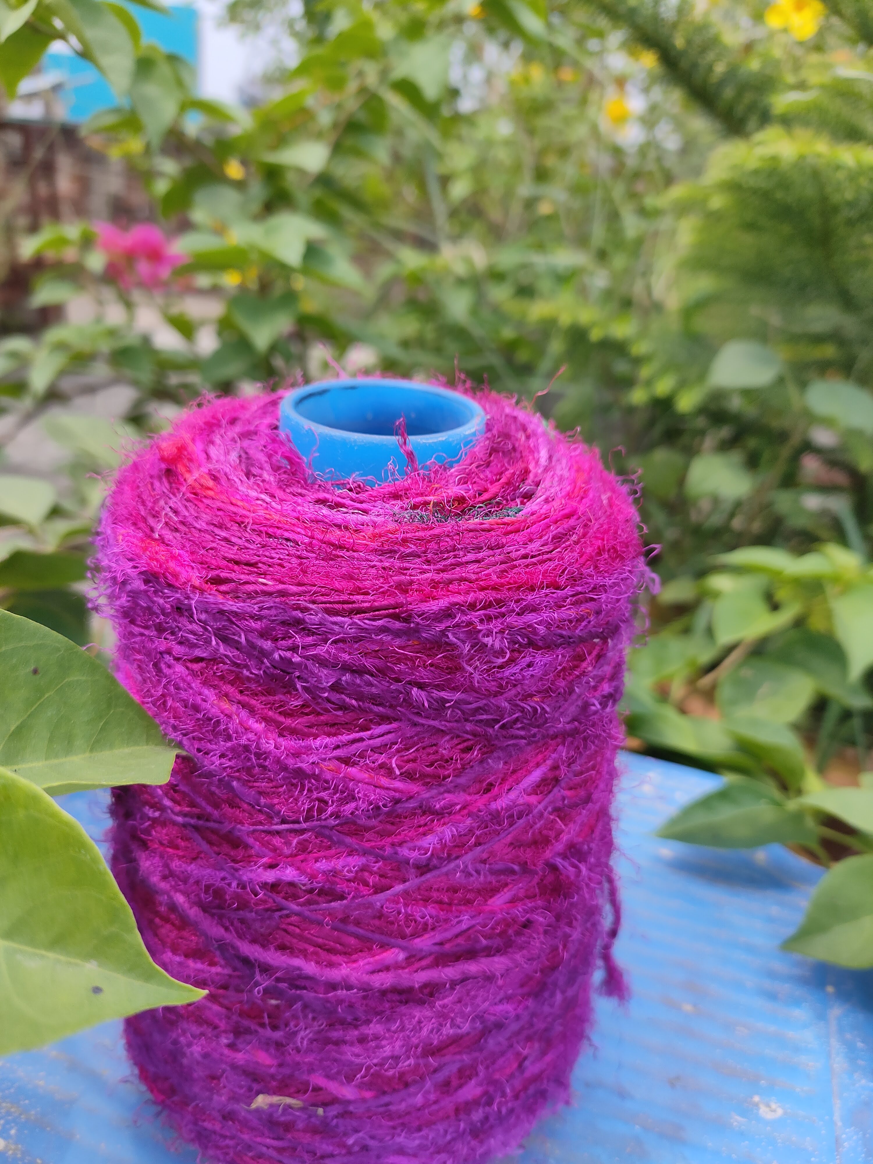 Recycled Sari Silk Yarn Prime Pink - SilkRouteIndia - Recycled Sari Silk Yarn Prime Pink that is available in multitude of colors, and being premium, you get extra length of yarn in the same weight. We fabricate Sari Silk Yarn from the bi-product of sari and silk production units. The Yarn, available with us, is hand spun into bright hanks which is suitable for number of Handicrafts applications