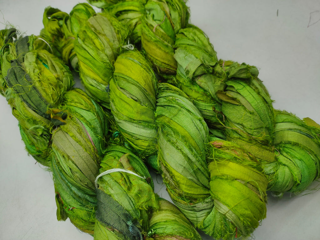 Recycled Sari Silk Ribbon - Green Petal - SilkRouteIndia Recycled Sari SilK yarn, Recycled Sari Silk Ribbon, Recycled Sari yarn, Recycled Silk Ribbon,upcycled ribbon, upcycled yarn, Himalaya Silk Yarn, Recycle Sari silk,	Recycle Silk,	Yarn for Knitting,	Knitting Yarn,	Crochet Yarn,	handcrafted yarn,	recycle sari yarn,	Sari Silk Yarn, reused ribbon, recycled ribbon
