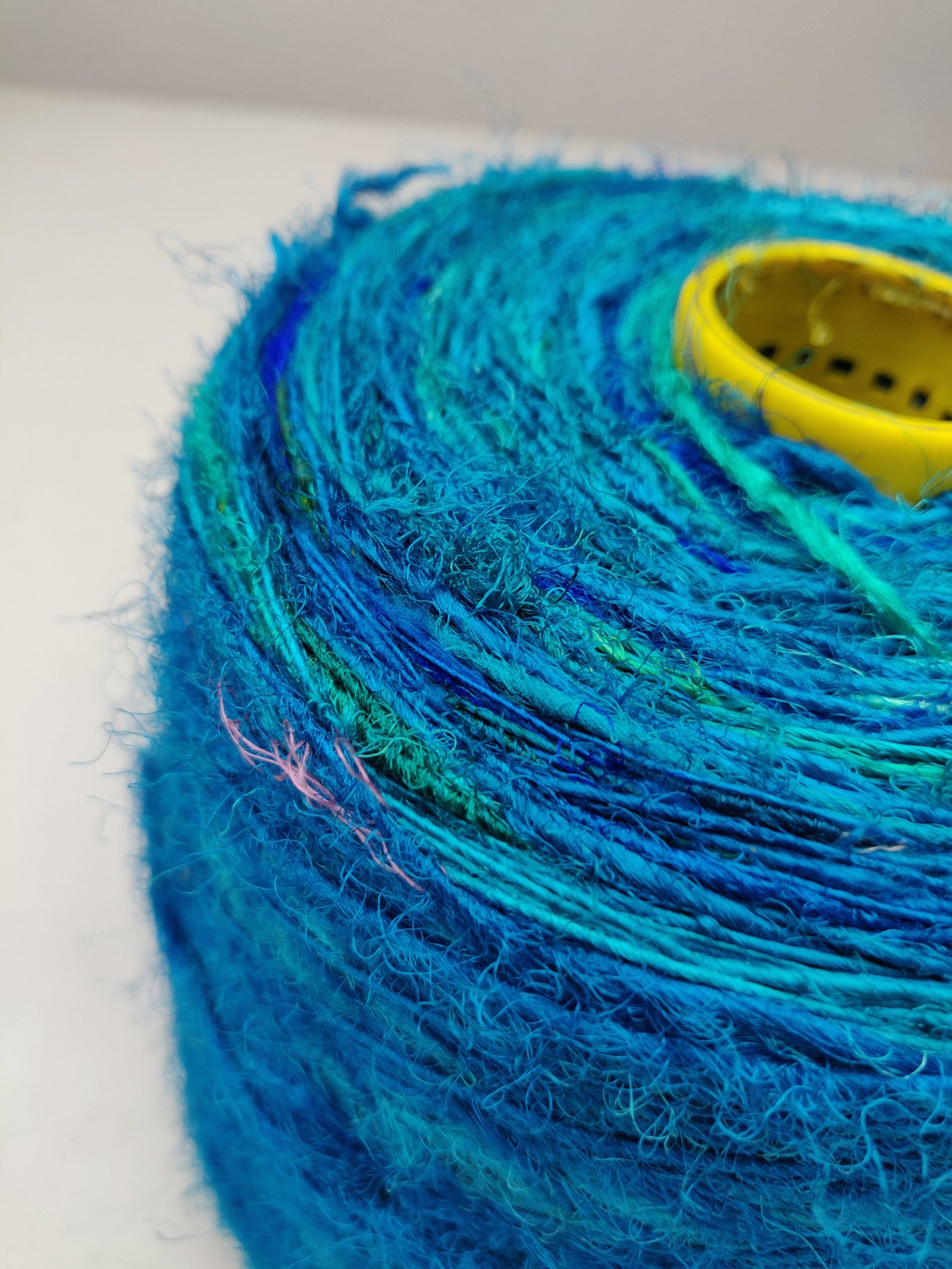 Recycle Sari Silk Yarn Prime - Sea Blue - SilkRouteIndia - Recycled Sari Silk Yarn Prime that is available in multitude of colors, and being premium, you get extra length of yarn in the same weight. We fabricate Recycled Sari Yarn from the bi-product of sari and silk production units.