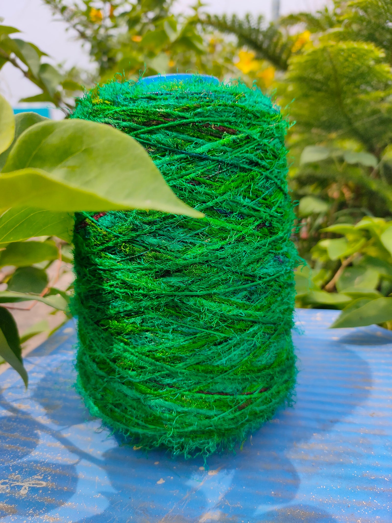 Recycle Sari silk Yarn Prime - Green that is available in multitude of colors, and being premium, you get extra length of yarn in the same weight. We fabricate Sari Silk Yarn from the bi-product of sari and silk production units. The Yarn, available with us, is hand spun into bright hanks which is suitable for number of Handicrafts applications. Sari Silk yarn comes with various fiber mixes that also happens to help people and the planet.