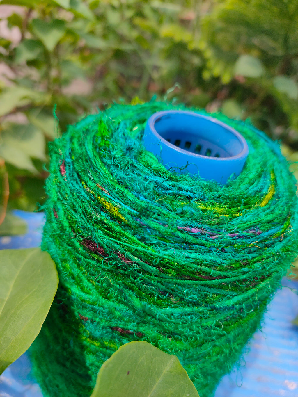 Recycle Sari silk Yarn Prime - Green that is available in multitude of colors, and being premium, you get extra length of yarn in the same weight. We fabricate Sari Silk Yarn from the bi-product of sari and silk production units. The Yarn, available with us, is hand spun into bright hanks which is suitable for number of Handicrafts applications. Sari Silk yarn comes with various fiber mixes that also happens to help people and the planet.